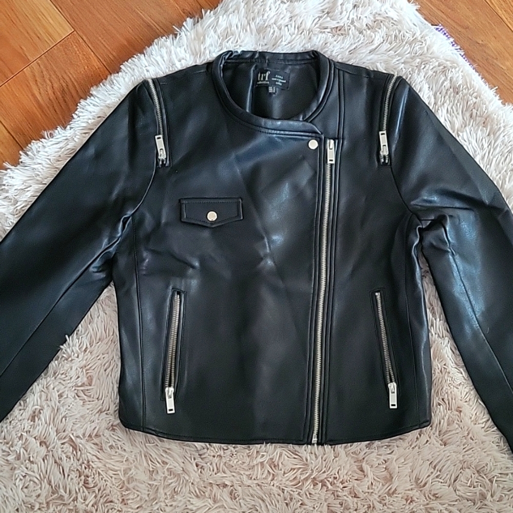 Black leather like jacket with pockets